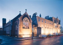 Our Dublin Hostel in Dublin City Centre at night - you can see the Church at the end - our restaurant for guests' free breakfast!